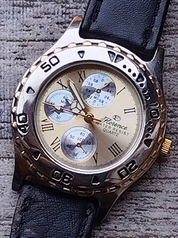 ELEGANT LADIES FLORENCE WATCH WITH ROTATING BEZEL IN EXCELLENT WORKING CONDITION