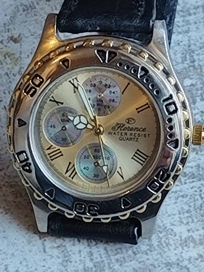 ELEGANT LADIES FLORENCE WATCH WITH ROTATING BEZEL IN EXCELLENT WORKING CONDITION