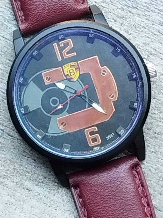 MENS BULKY BAISHA FASHION WATCH IN EXCELLENT WORKING CONDITION