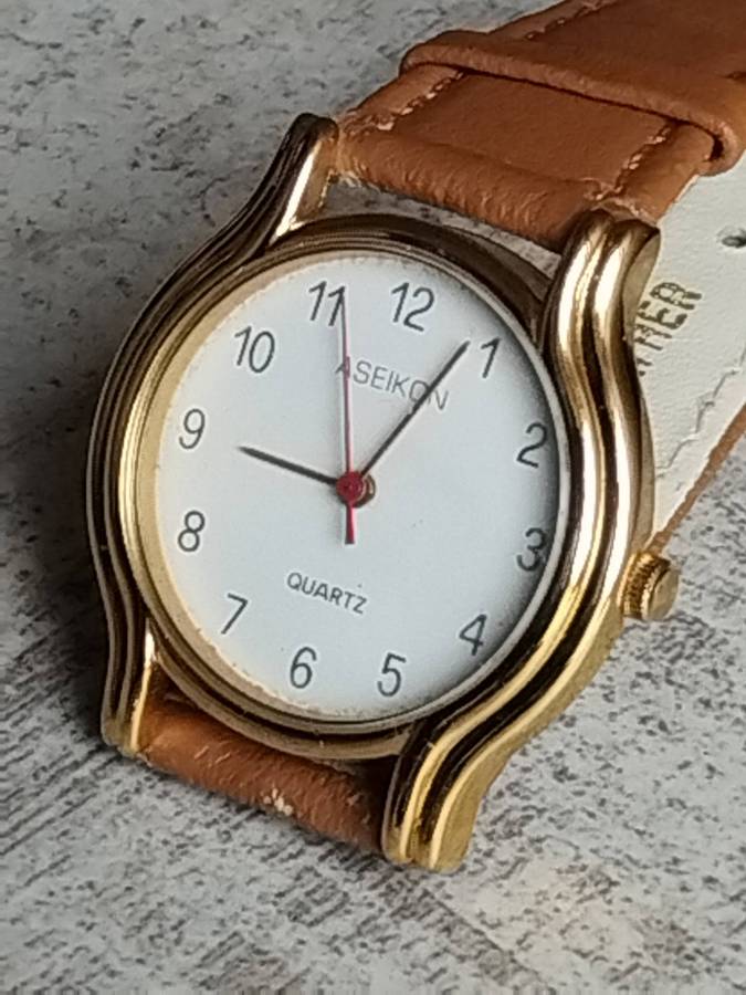 LADIES ASEIKON GOLD WATCH IN EXCELLENT WORKING CONDITION
