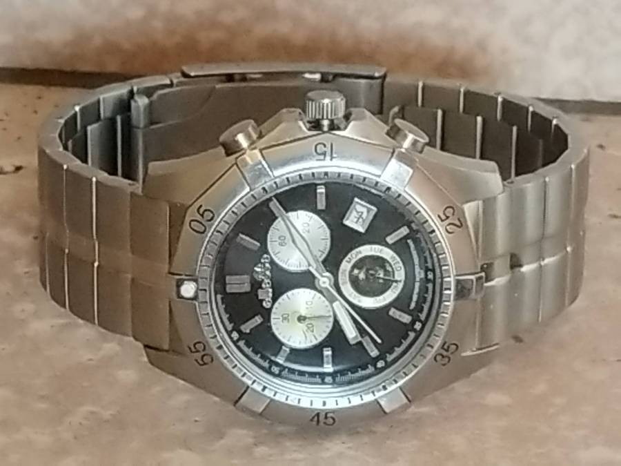 MENS ELLESSE WATCH WITH ROTATING BEZEL IN EXCELLENT WORKING CONDITION - READ DESCRIPTION
