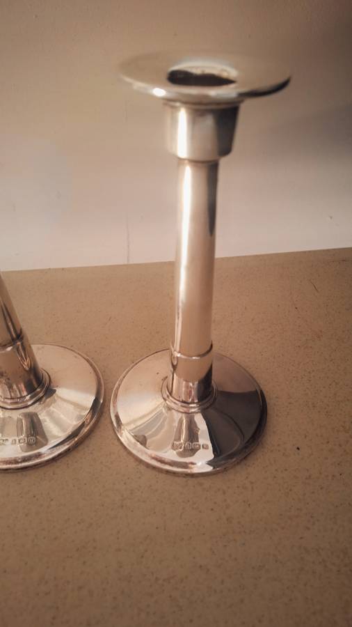 A pair of vintage hallmarked sliver candles