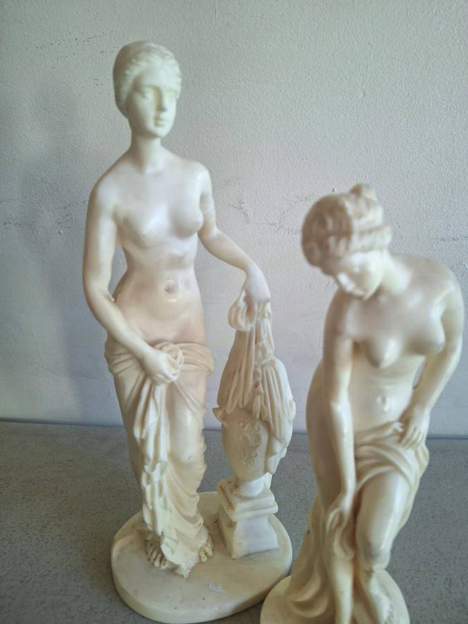Two resin lady figurines