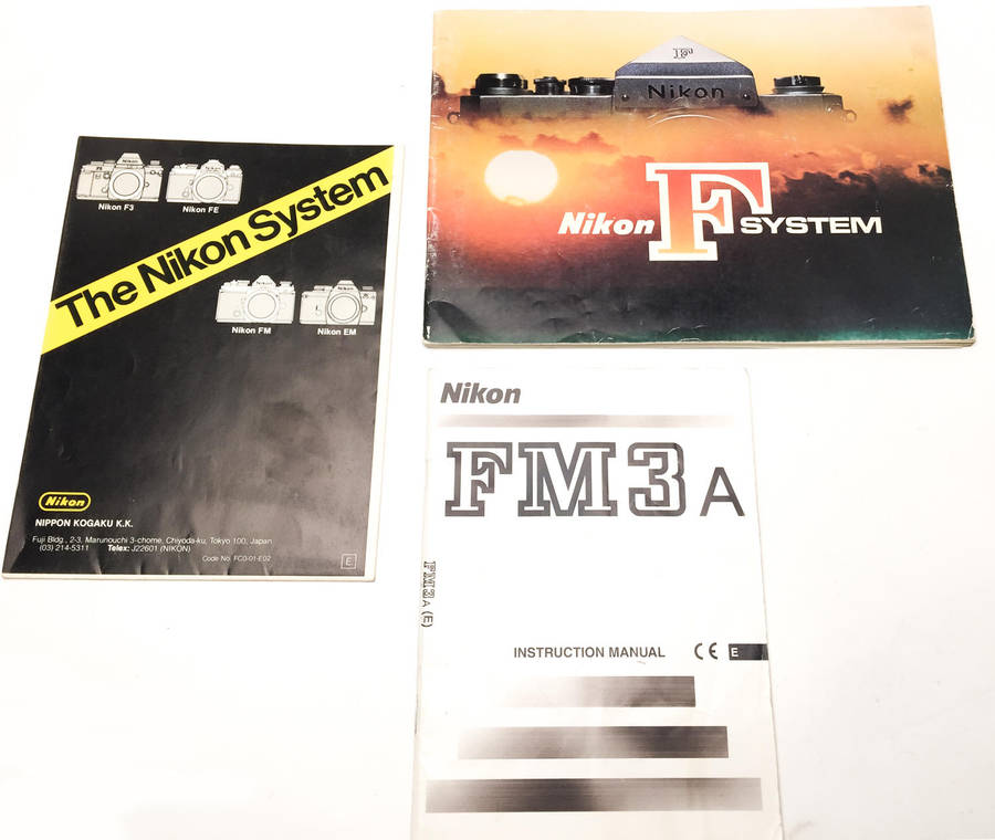 12x Camera Booklets and Manuals (Pentax, Leica, Canon, Nikon)