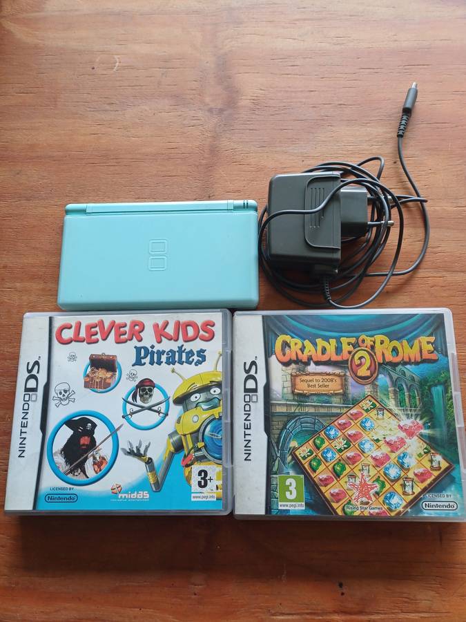 Nintendo DS Bundle (Console Charger and 2 games)