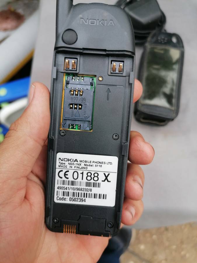 Vintage mobile phone nokia 5110 with charger