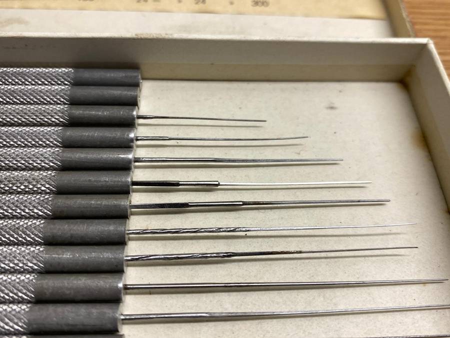 Watchmakers/jewelers cutting & smoothing broaches