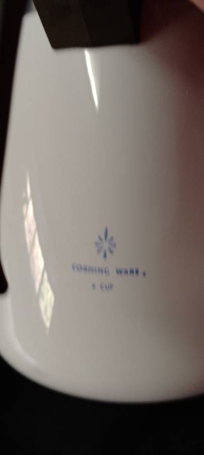 A  corning ware stove top espresso coffee pot