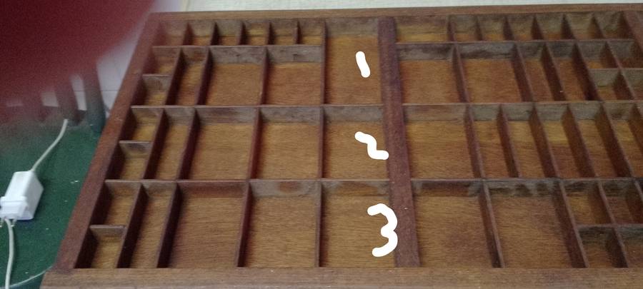 A VINTAGE WOODEN PRINTER'S TRAY