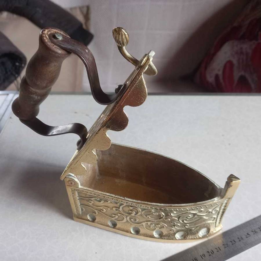 Vintage brass coal iron..quality item