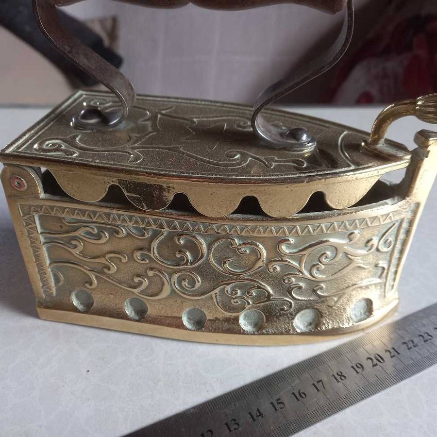Vintage brass coal iron..quality item