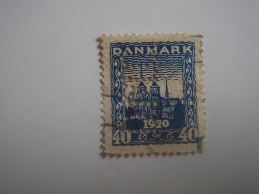 1920 Denmark - Slesvig - SG212 used, stamped with perfins 'D.M.C.'