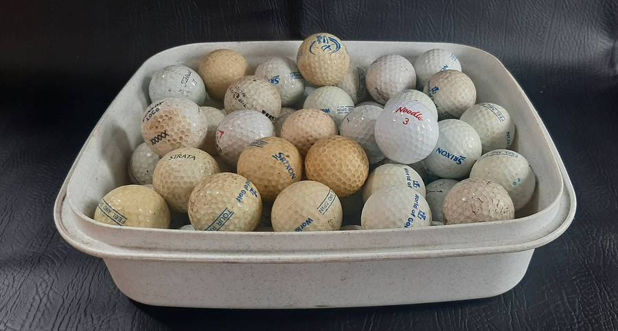 LOT OF 58 USED GOLF BALLS  MIXED BRANDS & PLAYWEAR
