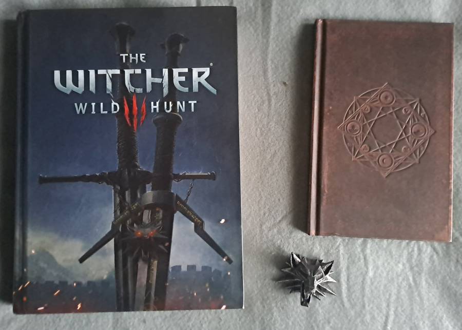 The Witcher 3 wild hunt collector's edition art book and strategy guide.