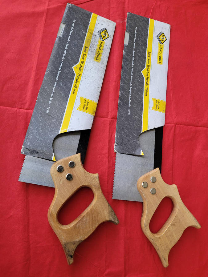 Unused 300mm wooden-handle back saw. Bid per piece.