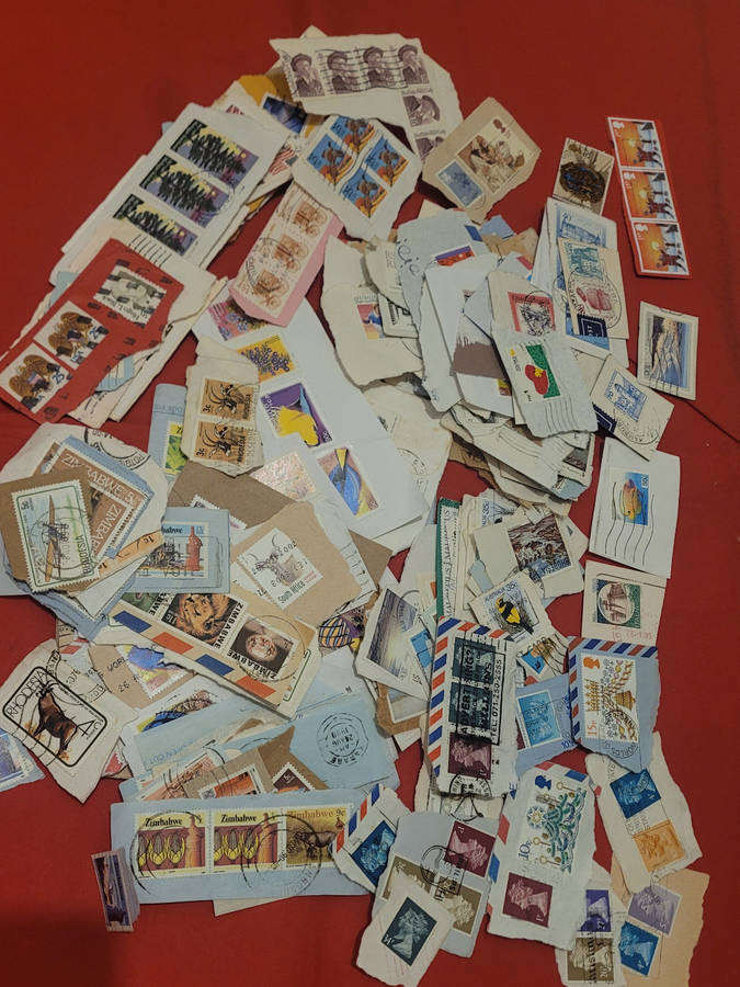 310x WORLD Stamps On Piece   (Lot 1)