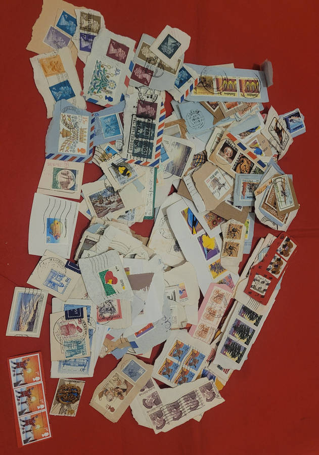 310x WORLD Stamps On Piece   (Lot 1)