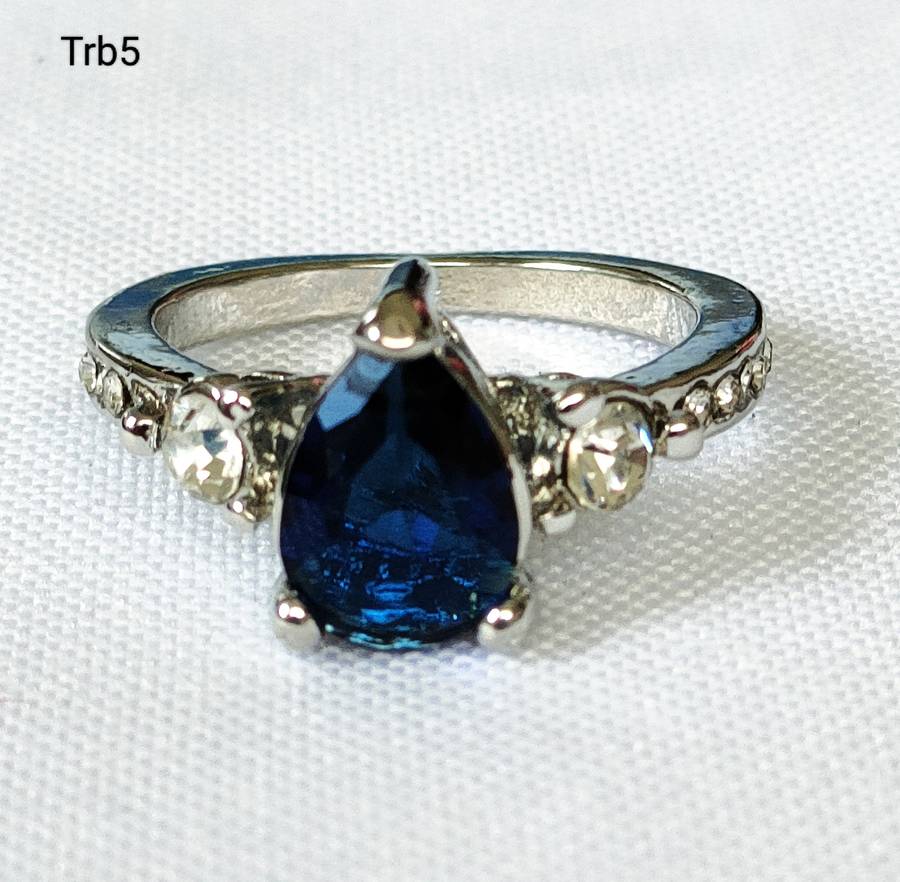Dress ring -lab created oval blue and white stones- size US 7