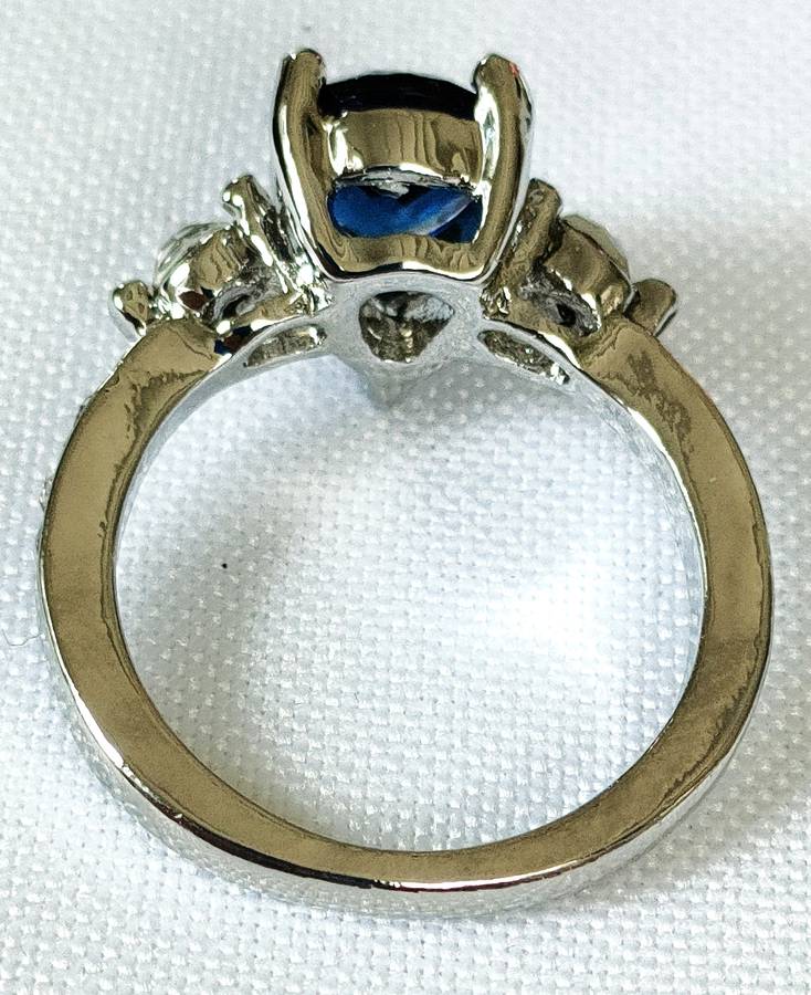 Dress ring -lab created oval blue and white stones- size US 7