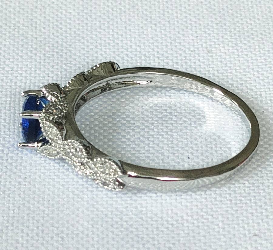 Dress ring -lab created blue and white stones- size US 8