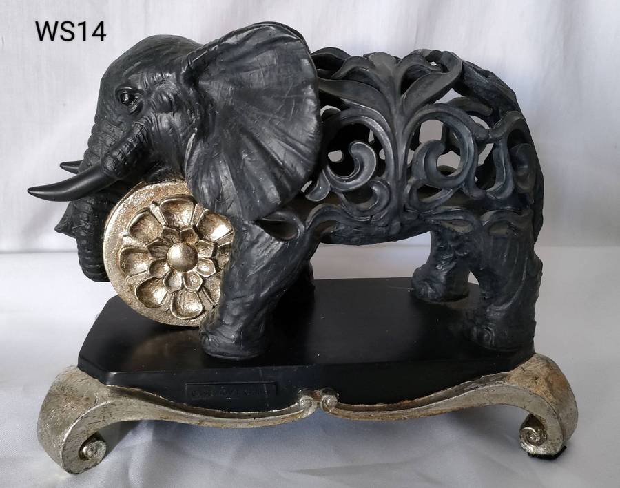 Vintage clock in an Elephant cast iron cut-out pattern on a solid metal stand-265x205mm