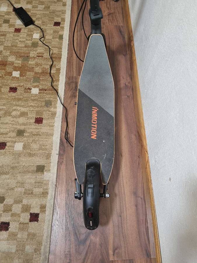 ## Inmotion A1 Electric Scooter with charger, not used much at all ##