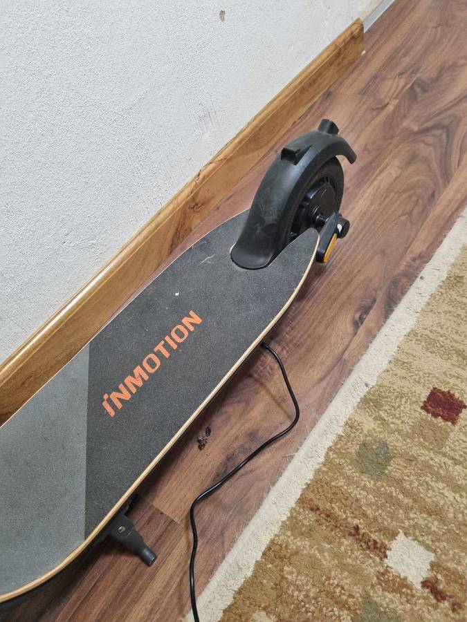 ## Inmotion A1 Electric Scooter with charger, not used much at all ##