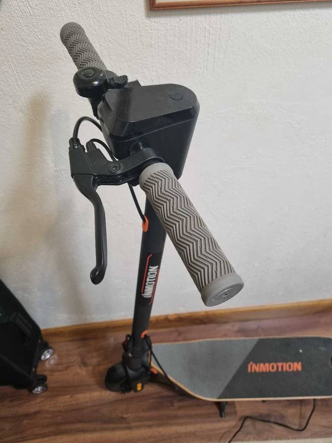 ## Inmotion A1 Electric Scooter with charger, not used much at all ##