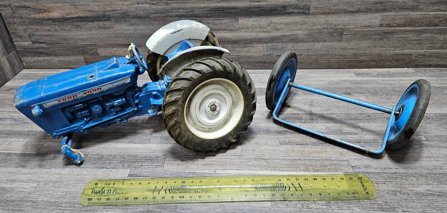 Vintage toy car parts as pictured