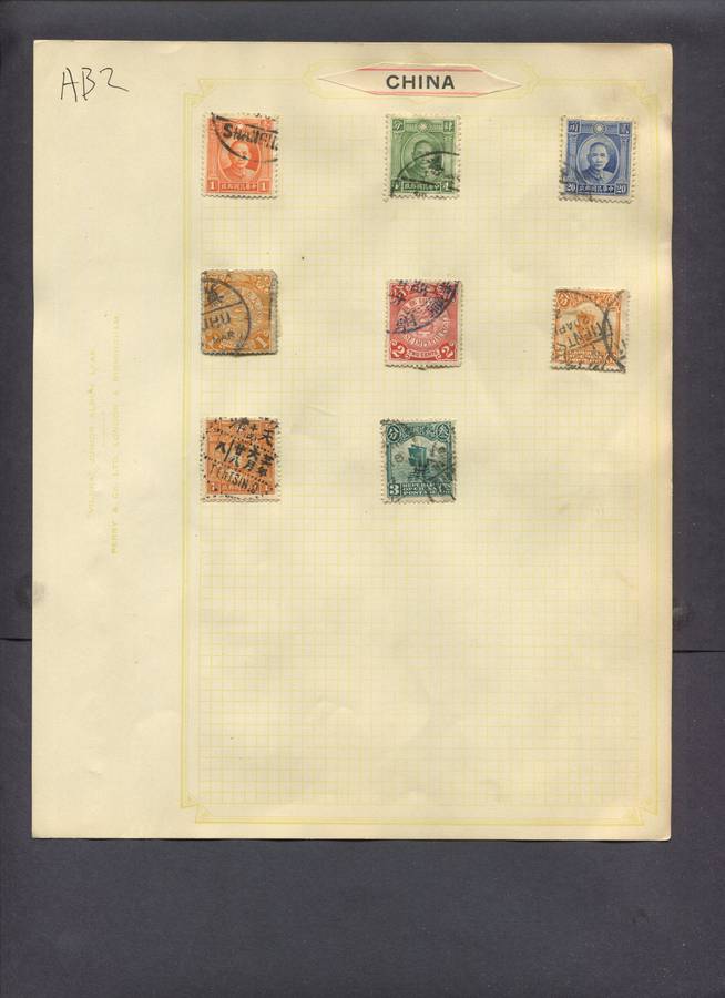 China - 8 Stamps Mounted On Old Album Page