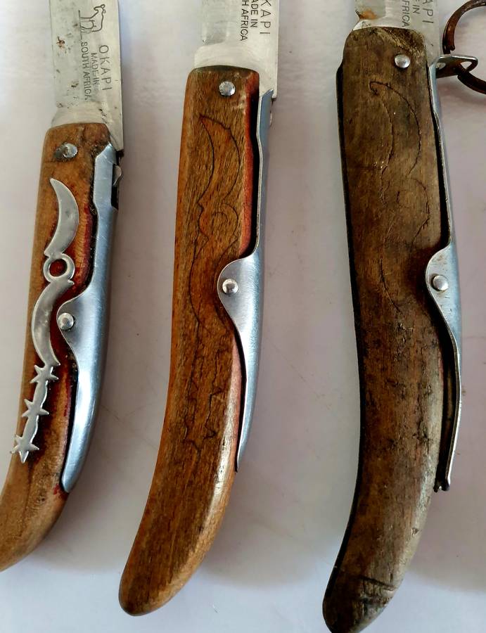 7 X VINTAGE OKAPI FOLDING KNIFES. 5 X 23CM, 1X 21CM, 1 X 18CM.