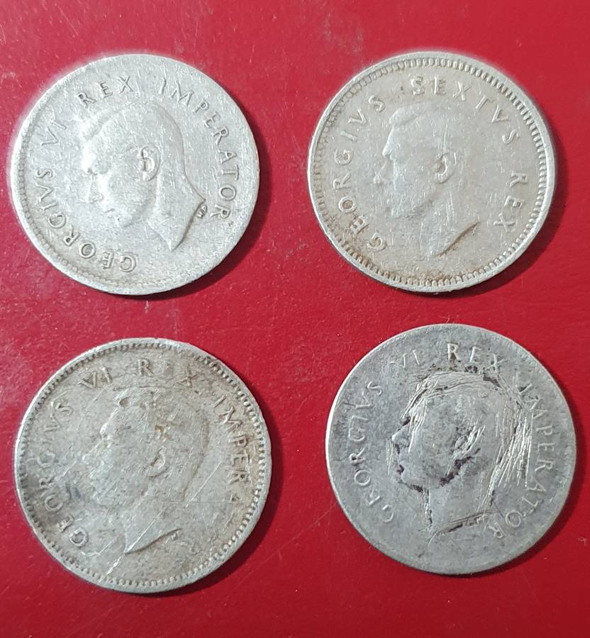 4 X 3 PENCE SILVER COINS . 1939,1941,1945,1950  Silver (.800) total: 5.64 g . one bid for all.