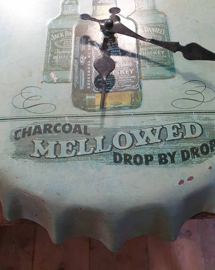 VINTAGEJACK DANIELS   HUGE EMBOSSED METAL BOTTLE LID SHAPE WATCH. 360mm DIA.