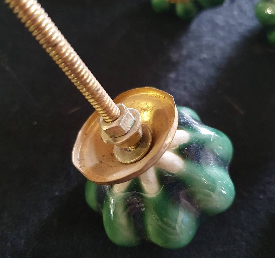 5 X ANTIQUE PORCELIAN AND BRASS  DOOR KNOBS.