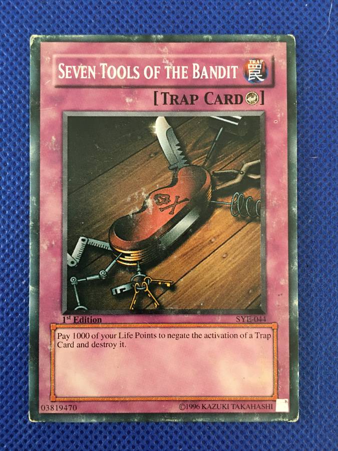 YU-GI-OH TRADING CARD - SEVEN TOOLS OF THE BANDIT