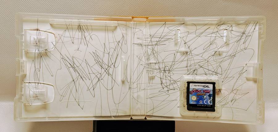 Nintendo DS Lite (Limited Edition Lime Green) handheld console with bundled games