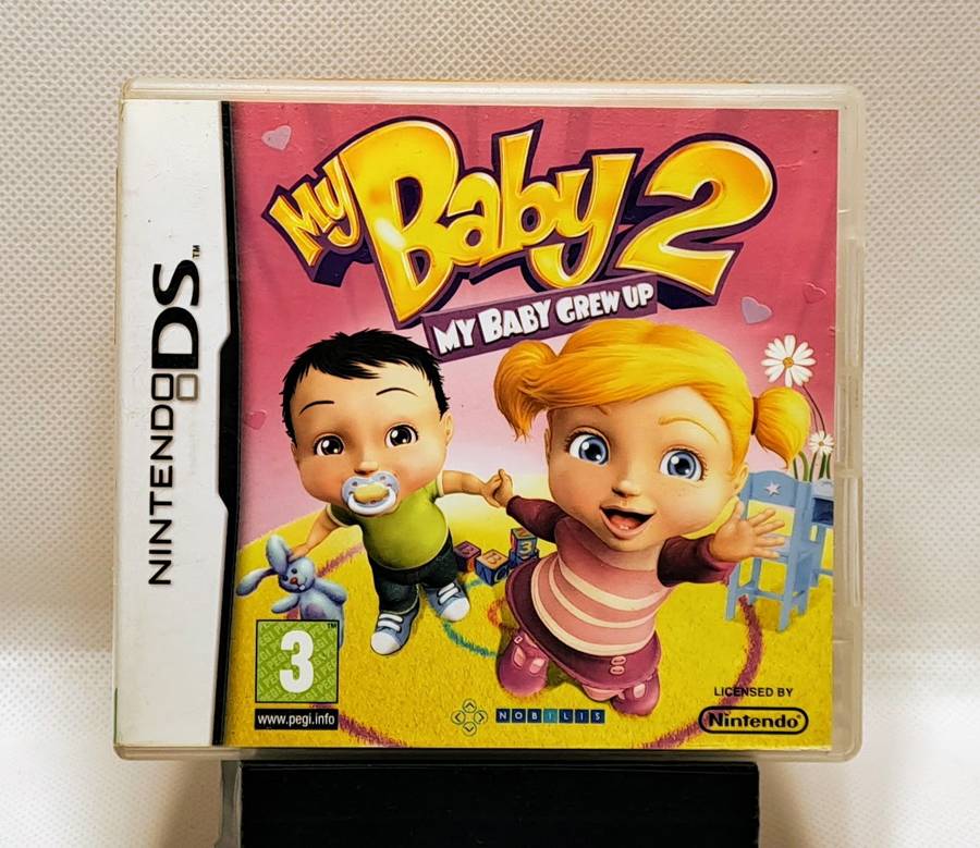 Nintendo DS Lite (Limited Edition Lime Green) handheld console with bundled games