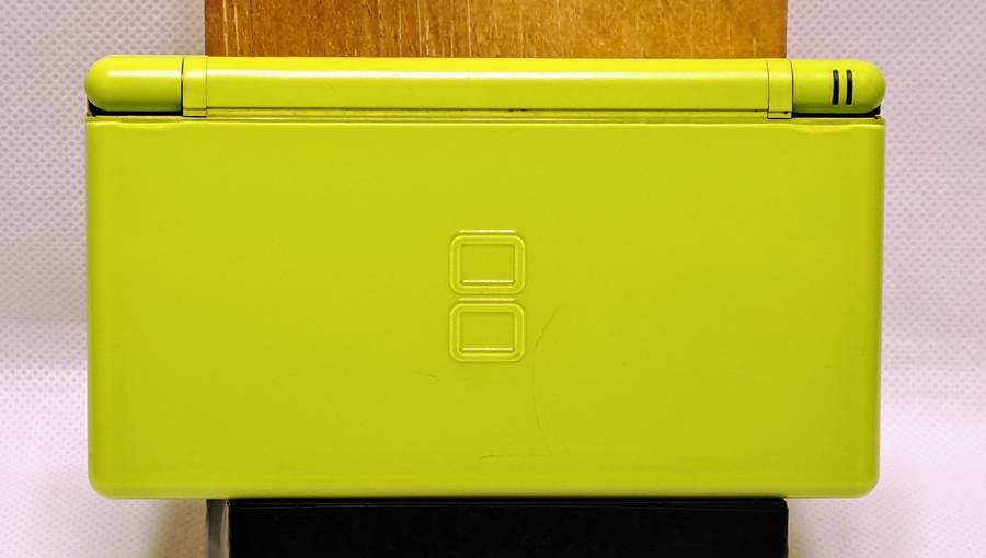 Nintendo DS Lite (Limited Edition Lime Green) handheld console with bundled games