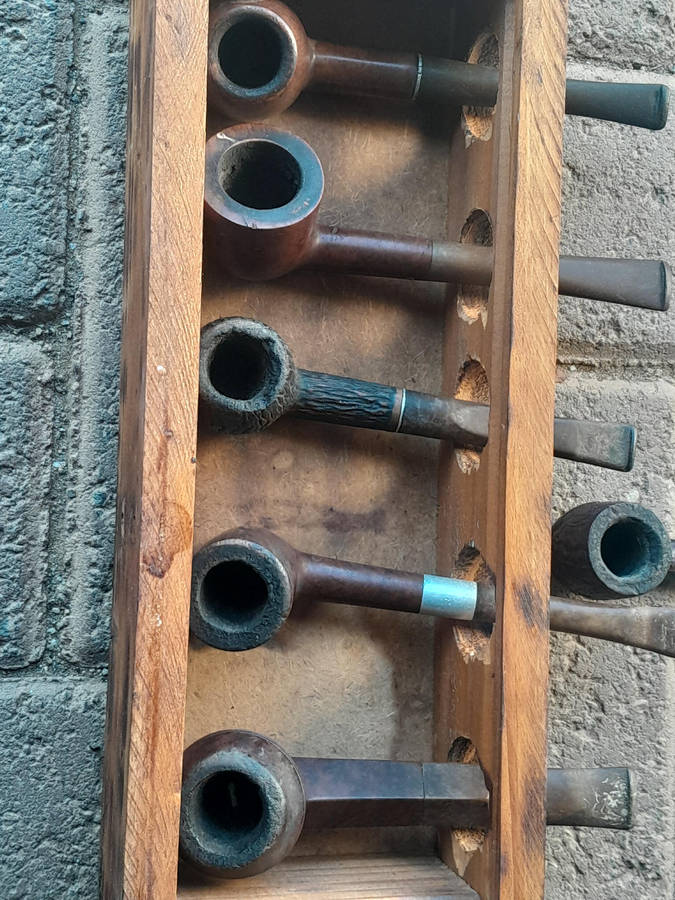 Lot of tobacco pipes.