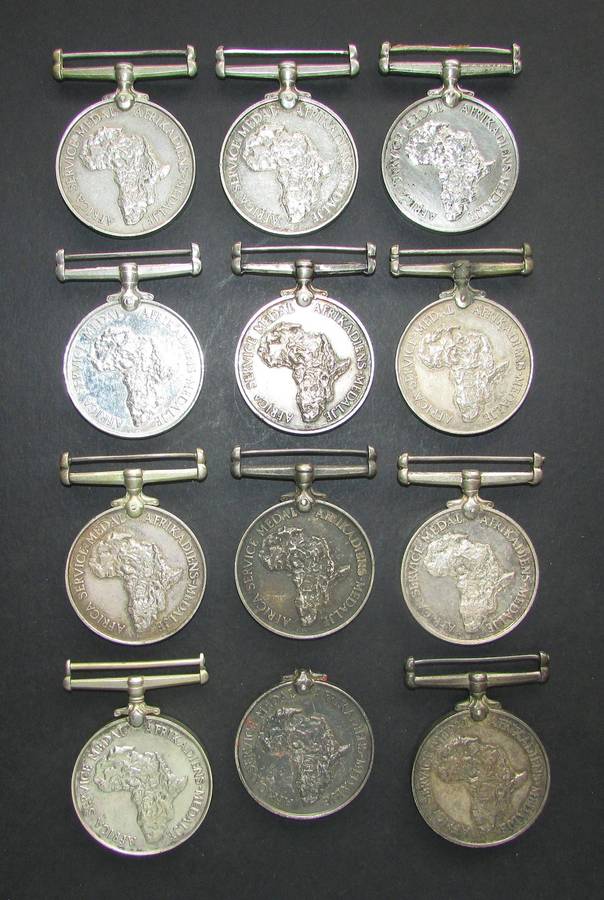 12 Full Size ( Silver ) Africa Service Medals issued to various Recipients ( Under Silver Value )