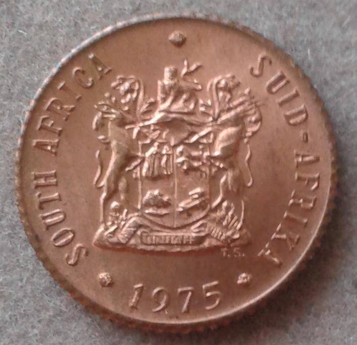 Scarcer 1975 uncirculated 1/2c (mintage: 20000).