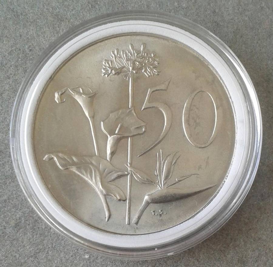 Encapsulated  1969 English uncirculated nickel 50c (mintage: 7968)