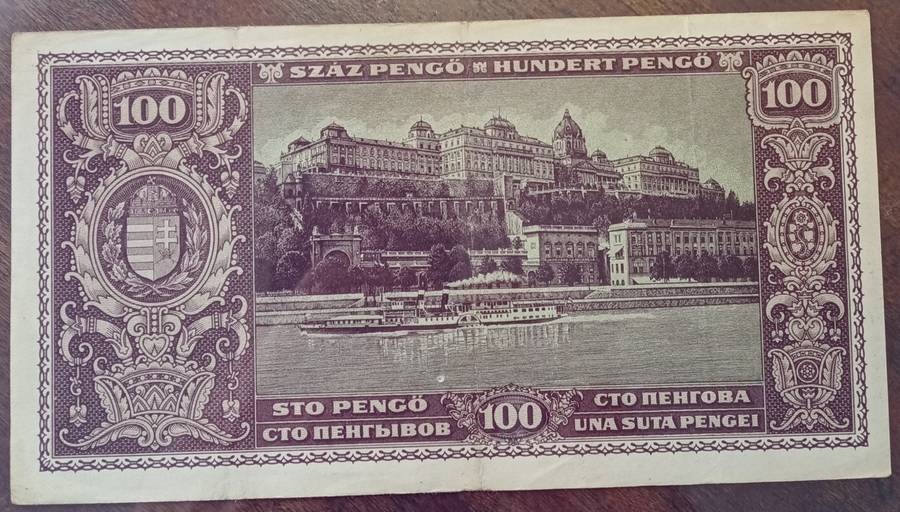 1945 WW2 Hungary 100 Pengő note in hard plastic sleeve