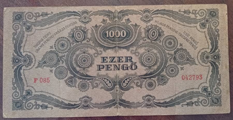 1945 WW2 Hungary 1000 Pengő note in hard plastic sleeve