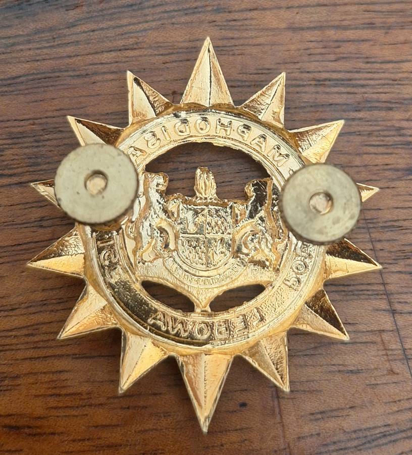 EX HOMELAND - LEBOWA POLICE GILDING CAP BADGE - SCREWS INTACT