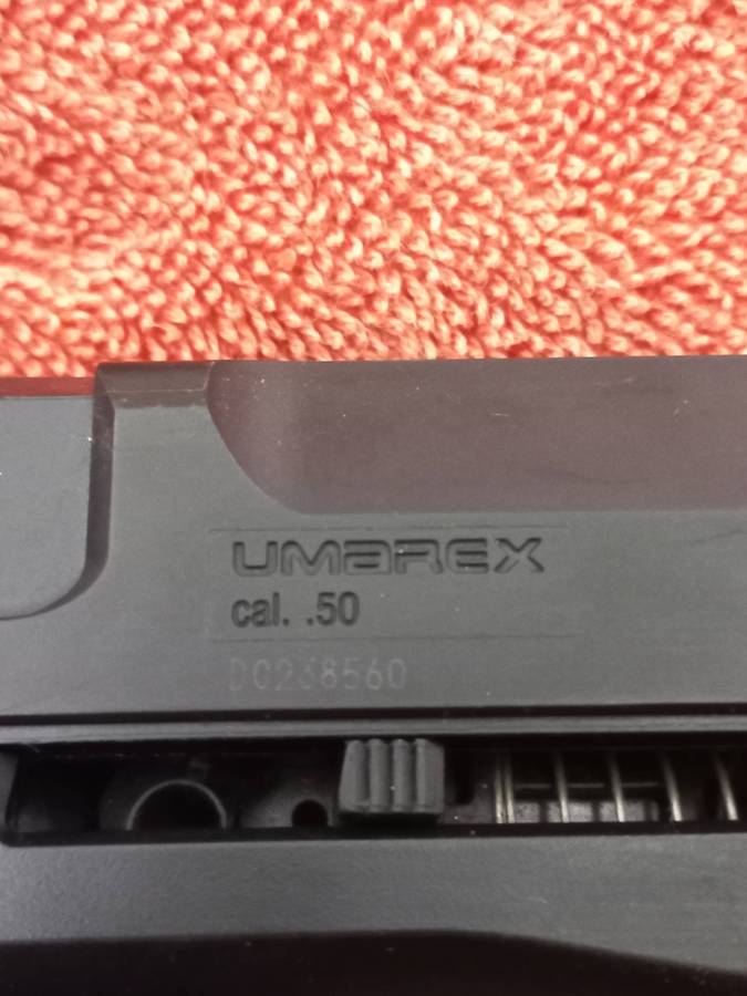 Co2 gas pistol Umarex T4E HDP 50 Pistol with co2 canisters, black solid balls & red pepper balls