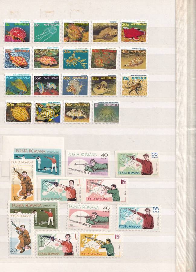 Green 15 page stamp album with some stamps, good used condition