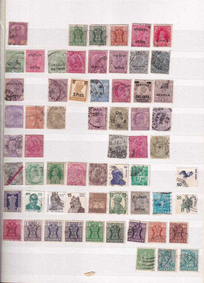 Red 15 page album with India stamps , M/H & used          ( good used condition with faults)