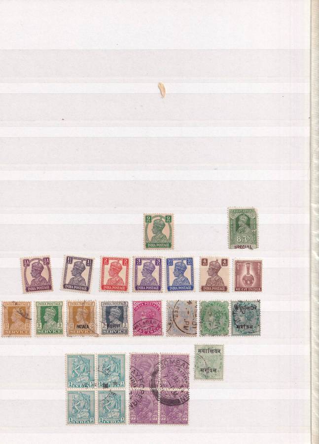 Red 15 page album with India stamps , M/H & used          ( good used condition with faults)