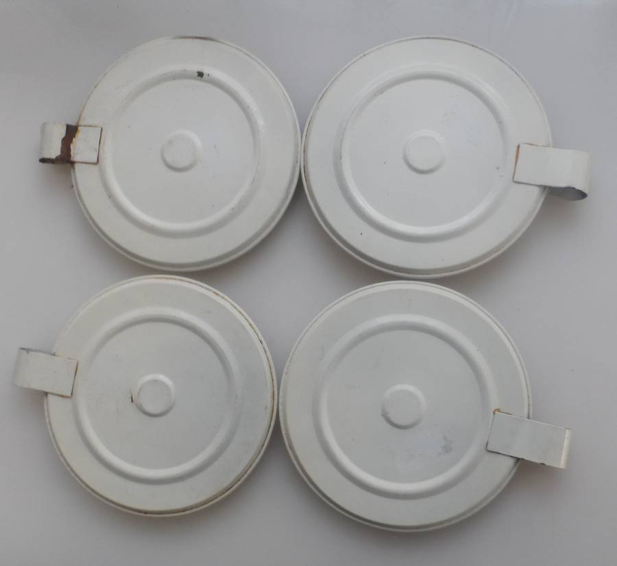 CANDLE STICK HOLDERS - VINTAGE SET OF FOUR , PRESSED TIN  , WHITE